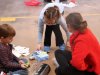 Children at Stepping Stones Ohio Saturday Kids Club share their holiday gifts.