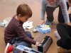 Child at Stepping Stones Ohio Saturday Kids Club plays with new truck toy.