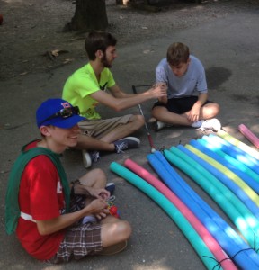 Zach, Tim and Austin work together on their raft!
