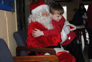 Brayden gives Santa a thank you hug! 