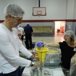 Stepping Stones and Rotary Club of Cincinnati package 20,000 meals for Stop Hunger Now