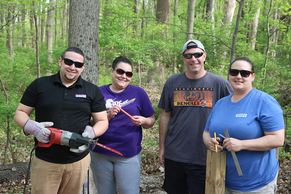 Pizza Hut managers volunteer at Stepping Stones' Camp Allyn in Batavia, Ohio